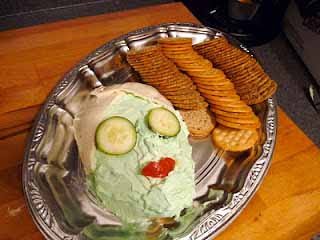 spa facial cheese ball appetizer served with crackers. 