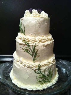 3-tier wedding cake cheese ball with fresh dill. 