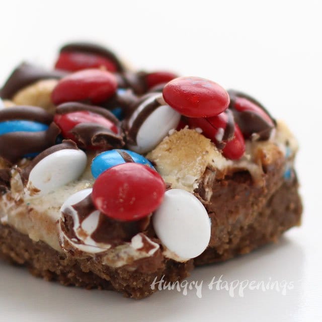 Red, White and Blue M&M's Top these festive looking S'mores Magic Bars and make the perfect dessert for your 4th of July parties. Recipe from HungryHappenings.com