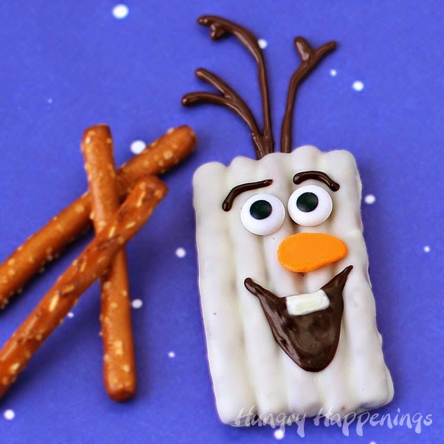 Olaf Pretzels - white chocolate dipped pretzels decorated to look like Olaf from Disney's Frozen. 