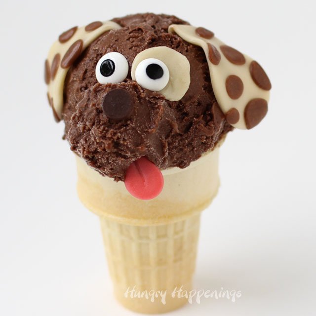 Treat your kids to a cool summer treat. These Double Chocolate Ice Cream Cone Puppies will have them begging for more. Recipe from HungryHappenings.com