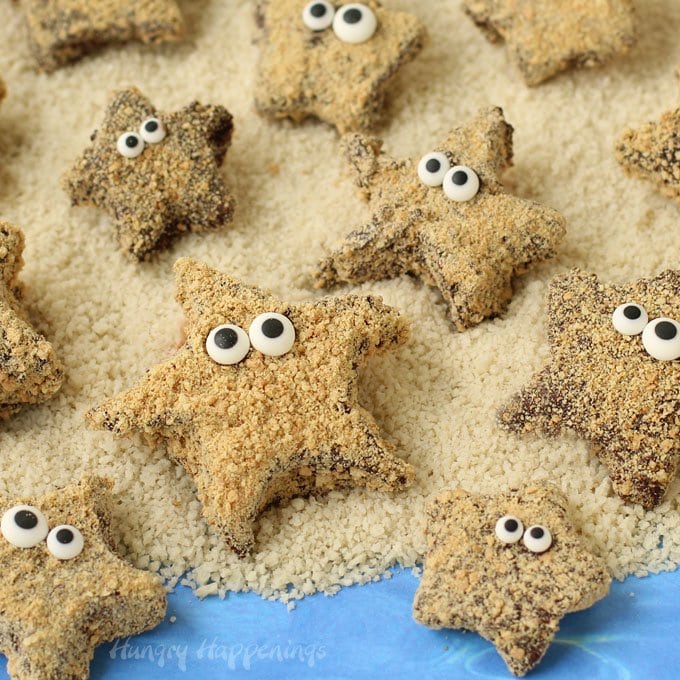 Turn store bought marshmallows into adorable S'mores Starfish for your beach themed summer party. No fire needed!