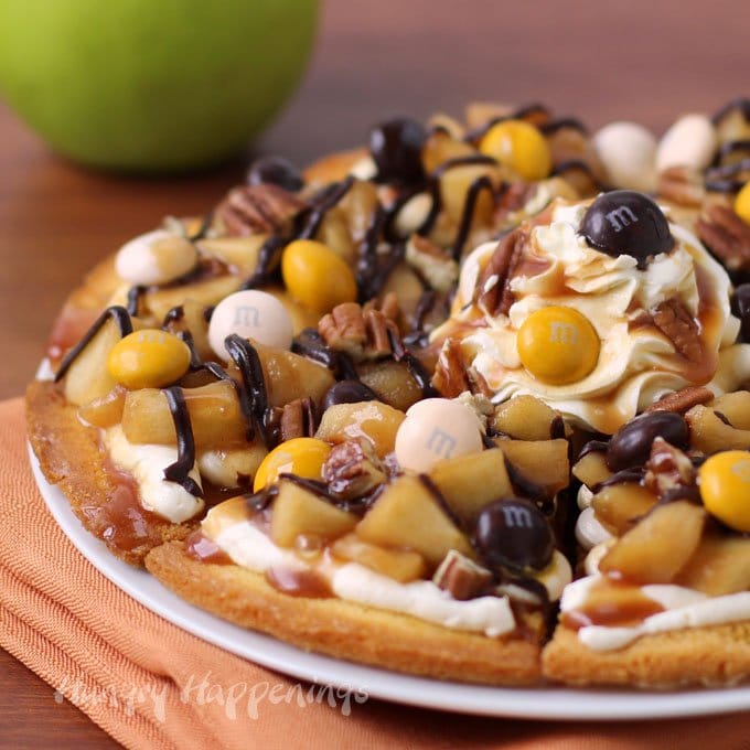 Caramel Apple Cake Chip Nachos Drizzled with Chocolate and Caramel Sauce, Toasted Pecans, and Pecan Pie M&M's