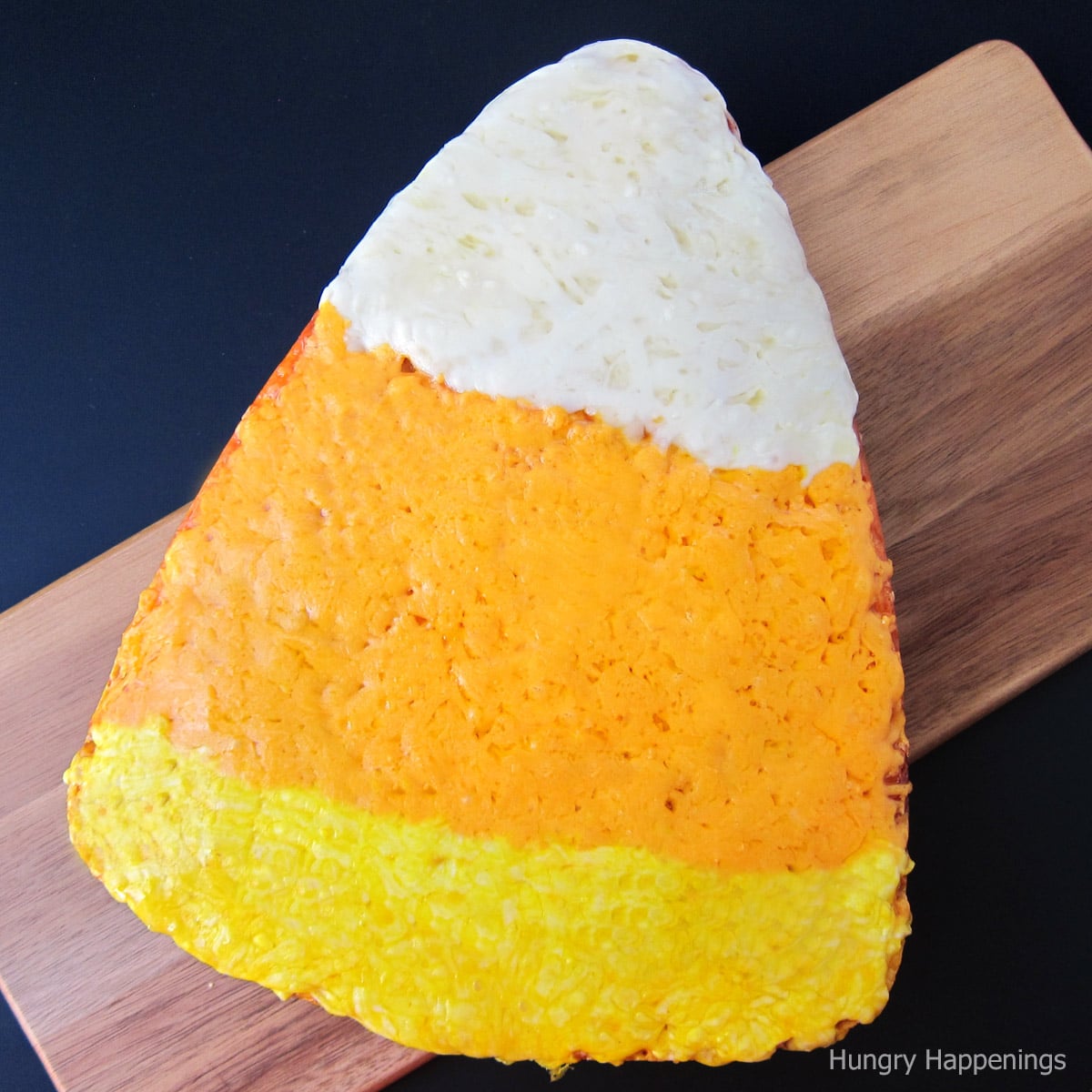 Halloween cheese bread decorated like candy corn