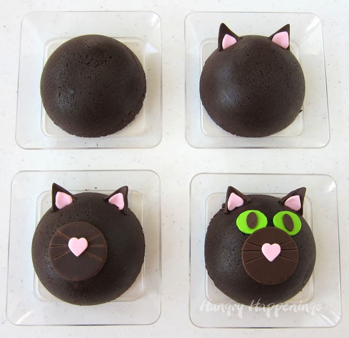 decorating chocolate cat cakes.