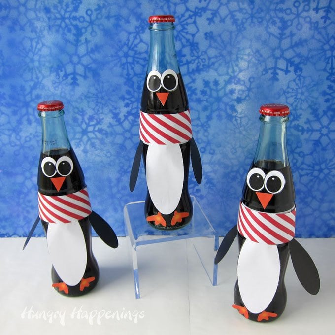 Turn Coca-Cola Bottles into adorable Penguins using a free printable. 