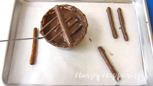 Dip pretzels in chocolate to use for the brim of a scarecrows hat.