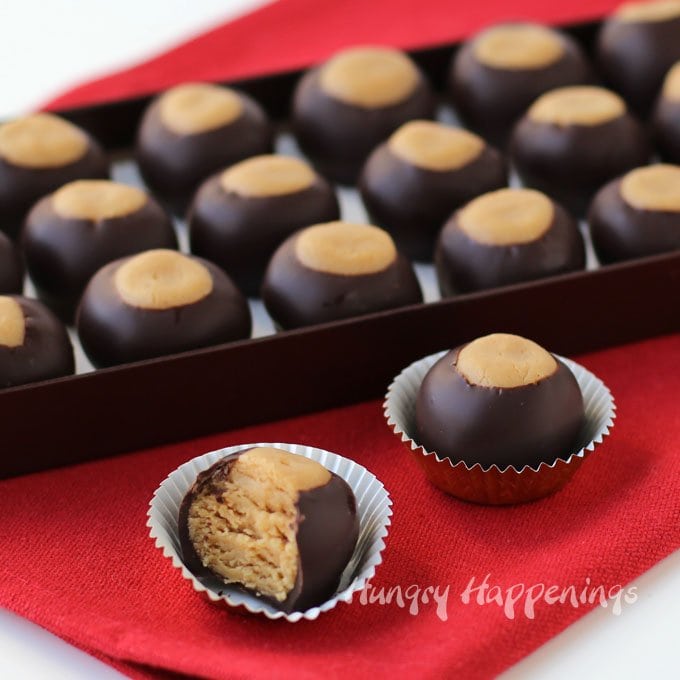 Turn peanut butter cake into Cake Ball Buckeyes to add a fun twist to your holiday candy plates. 