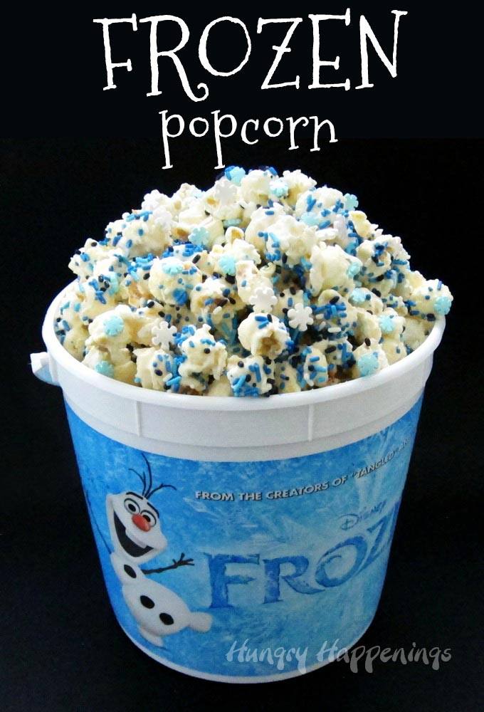 Snuggle up with your family and enjoy a movie night watching Disney's Frozen while munching on this fun snowflake sprinkle filled Frozen Popcorn. 