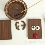 Turn store bought candy bars into Cute Christmas Treats in a snap. Just add two chocolate pretzel antlers, some candy eyes, and a shiny red nose and you have the sweetest Rudolph Candy Bars to give to friends and family this holiday season.