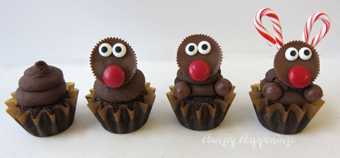 Decorate the ultimate chocolate cupcakes with a Reese's Cup Rudolph with a red Mega M&M nose and candy cane antlers.