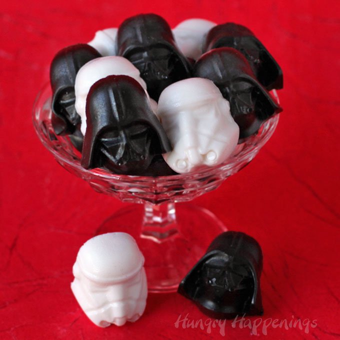 Who needs movie theater candy when you can make these fun Star Wars Treats for the big movie premier? These Darth Vader Cherry Cola Gummy Candies and Storm Trooper Lemon Lime Soda Gummy Candies will be the perfect snack to chew on while watching The Force Awakens.