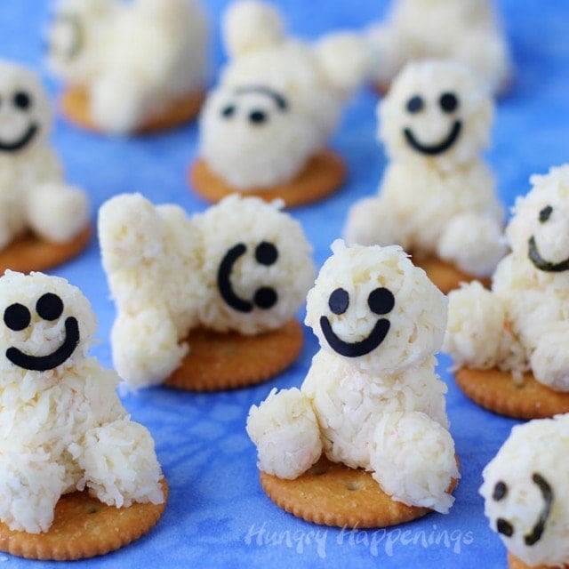 Cheesy Snowgie Snacks are so much fun to make and to eat and your kids are going to love them. They are perfect for a Frozen party or an afternoon snack. See how to make them at HungryHappenings.com