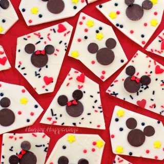Mickey and Minnie Mouse Chocolate Bark is so simple to make using chocolate wafers and chips. Add lots of sprinkles for fun. See the tutorial at HungryHappenings.com.