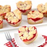 Just 2 ingredients is all you need to make these Heart Shaped Cherry Pie Bars. See this Valentine's Day recipe at HungryHappenings.com.