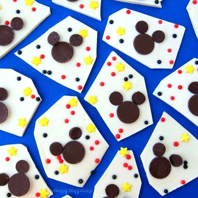 Mickey Mouse Chocolate Bark is so easy to make using chocolate wafers and chips. Toss on some sprinkles to make it even more fun. | HungryHappenings.com