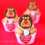 Turn Reese's Cups into adorably cute lions using caramel and heart sprinkles then use them to make Lion Cupcakes with 