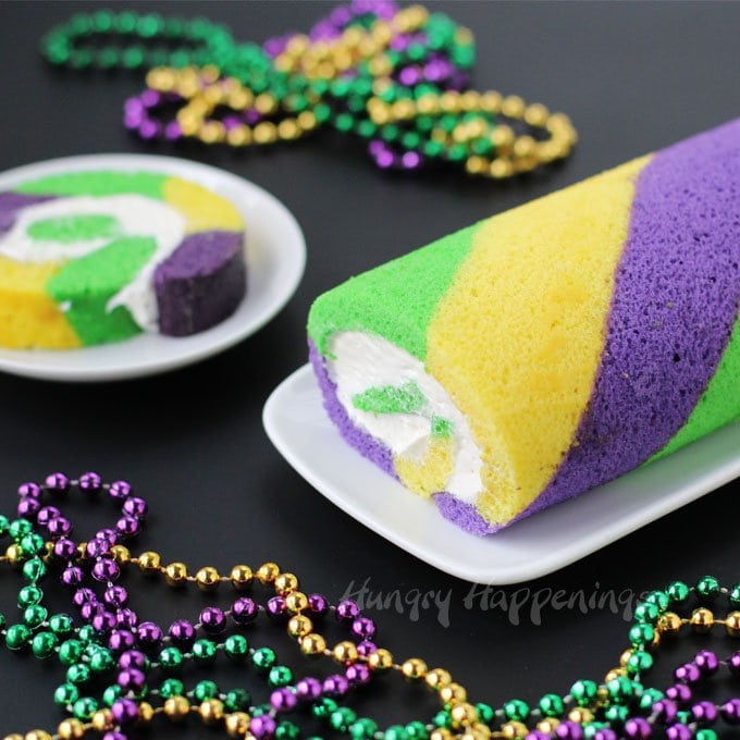 Break tradition and celebrate Mardi Gras by making this festive green, gold, and purple King Cake Roll.