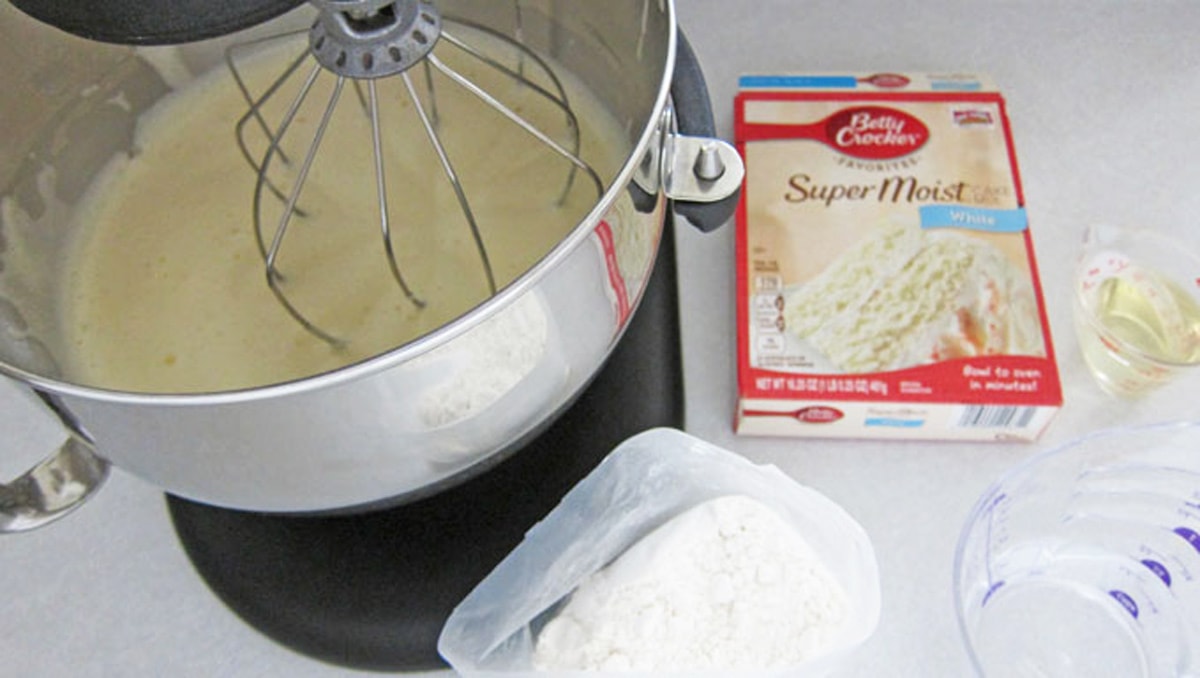 mixing white cake batter