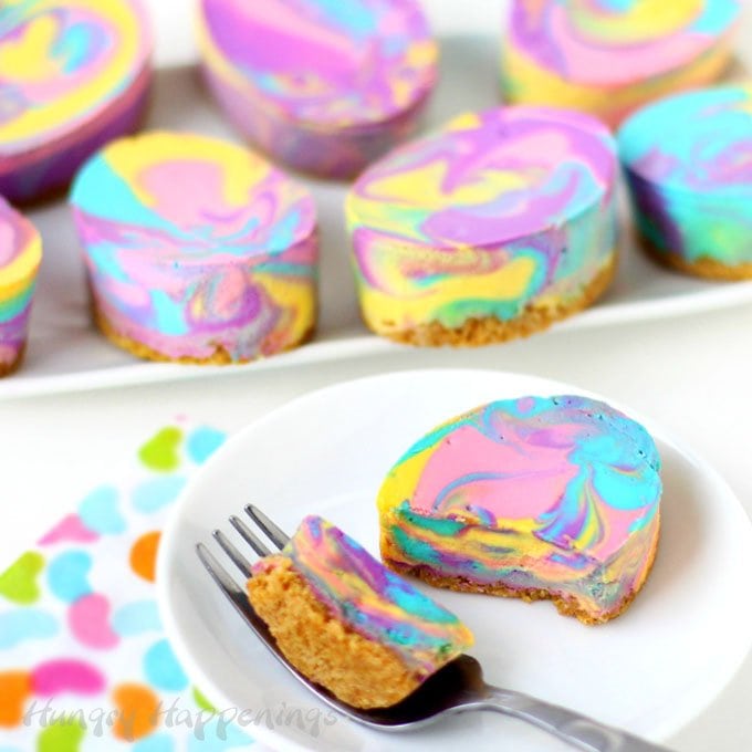 Colorful Tie-Dye Swirl Cheesecake Easter Eggs will brighten up your dessert table this holiday.