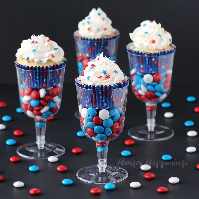 Serve Red, White, and Blue Cupcakes in plastic wine goblets or champagne flutes filled with candy. It's a quick and easy way to dress up a cupcake.