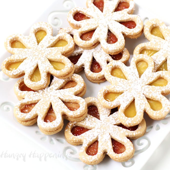 Turn crunchy almond cookies into pretty flowers. These Liner Cookie Daisies make perfect treats for Mother's Day, bridal showers, spring luncheons, or even an afternoon tea.