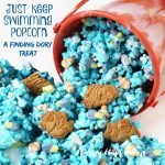 Just Keep Swimming Popcorn - A Finding Dory Treat. White chocolate popcorn sprinkled with Dory and Nemo marshmallows and cookies.