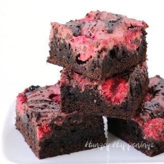 Raspberry Swirl Brownies filled with fresh raspberries and tiny bits of zucchini make a great summertime snack.