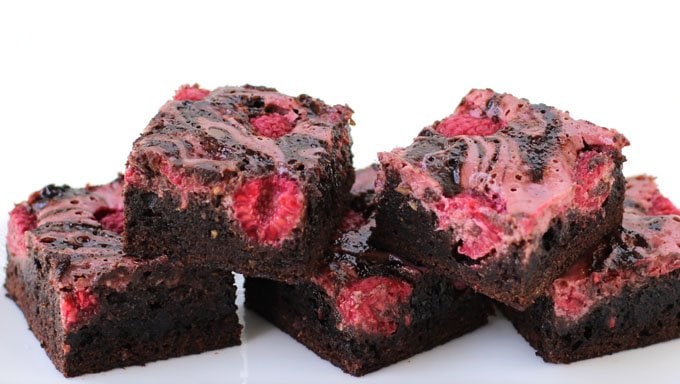Raspberry Swirl Brownies filled with fresh raspberries and tiny bits of zucchini make a great summertime snack.