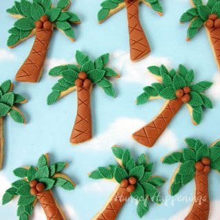 Decorate Palm Tree Cookies using modeling chocolate to give them texture including 3 dimensional coconuts.