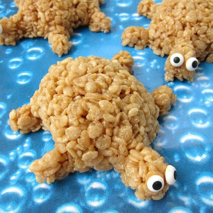 Use plastic sand molds to make these cute Caramel Rice Krispie Treat Turtles.