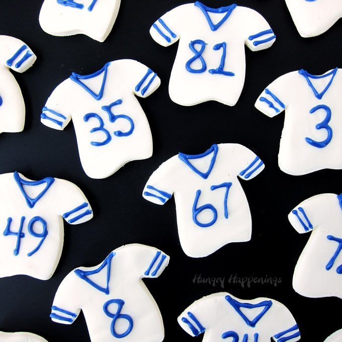 Make 2-Ingredient Fudge Football Jerseys to cheer on your favorite football team by simply decorating your treats using your team's colors.