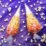 Dress up your popcorn to look like an iconic Halloween candy. Toss some popcorn in orange, yellow, and white Candy Melts and nestle the pieces in clear plastic cone shaped bags to create these festive Popcorn Candy Corn Bags.