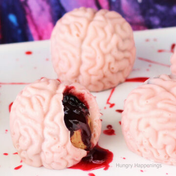 candy brains filled with peanut butter fudge and oozing raspberry jelly blood.