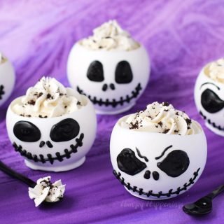 These Jack Skellington Chocolate Bowls filled with Cookies 'n Cream Cheesecake Mousse are to die for and they are perfect desserts to serve at a Halloween celebration or a Nightmare Before Christmas party.