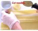 Cut Barilla Wavy Lasagna Noodles into strips and circles to make mini lasagna snowmen.