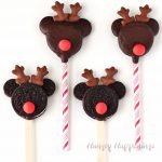 It's so easy to turn store bought cookies into these cute Mickey Mouse Rudolph Oreo Cookie Pops for Christmas. Your kids will love making and eating these sweet holiday treats.
