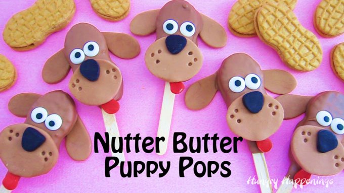 Puppies are so darn lovable and cute and they are hard to resist. These Chocolate Nutter Butter Puppy Pops with their floppy chocolate ears and sweet candy eyes are just as irresistible and will make sweet treats for Valentine's Day, puppy adoptions, and birthday parties.