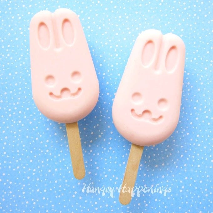 Blend together strawberry yogurt and Cool Whip to make these cute and easy Frozen Yogurt Bunny Pops. Your kids will enjoy these simple-to-make treats for Easter or on a hot summer day. 