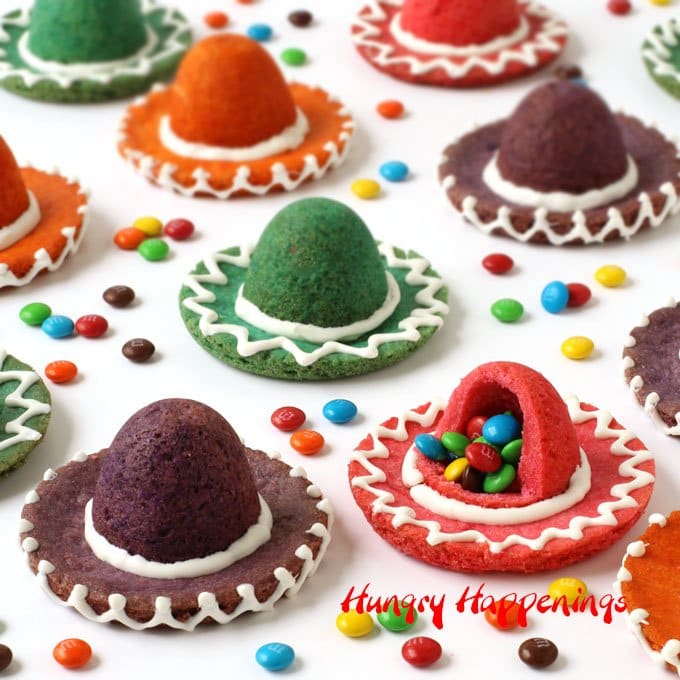 Break open one of these colorful Sombrero Cookies to reveal the surprise inside! These festive candy filled treats will be perfect for Cinco de Mayo or a Fiesta.