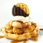 Top a Kellogg's Eggo Thick and Fluffy Waffle with Caramelized Bananas, Caramel Mousse, Whipped Topping, and a Chocolate Dipped Eggo Minis Waffle and you have the most decadent Caramel Banana Waffle Dessert.