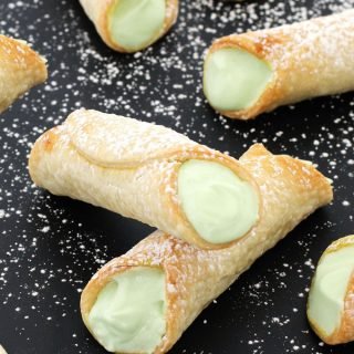 Give a classic summer recipe a fun twist. These sweet and tart Key Lime Pie Cannoli are simple to make using just 4 ingredients and don't need to be cut into slices when serving so they are perfect for an outdoor party, a pot-luck, or even a bridal shower.