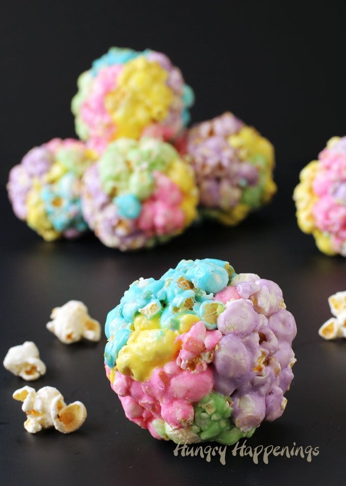 Multi-colored Peeps Popcorn Balls are simple to make using 3 ingredients and will brighten up your dessert table or basket this Easter. 