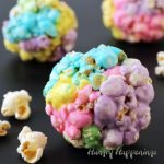 Multi-colored Peeps Popcorn Balls are simple to make using 3 ingredients and will brighten up your dessert table or basket this Easter.