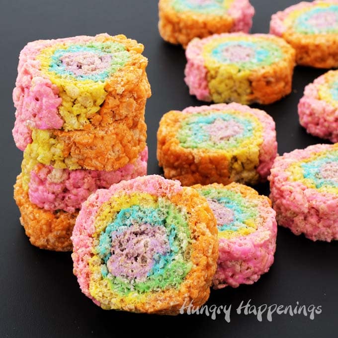 It's so easy to brighten up your cereal treat recipe and to make them more fun. These Rainbow Rice Krispie Treat Pinwheels will be the hit at your next party or holiday celebration. The are perfect for Easter, St. Patrick's Day, and birthdays!