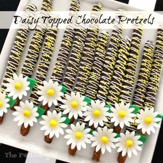Daisy topped chocolate pretzels