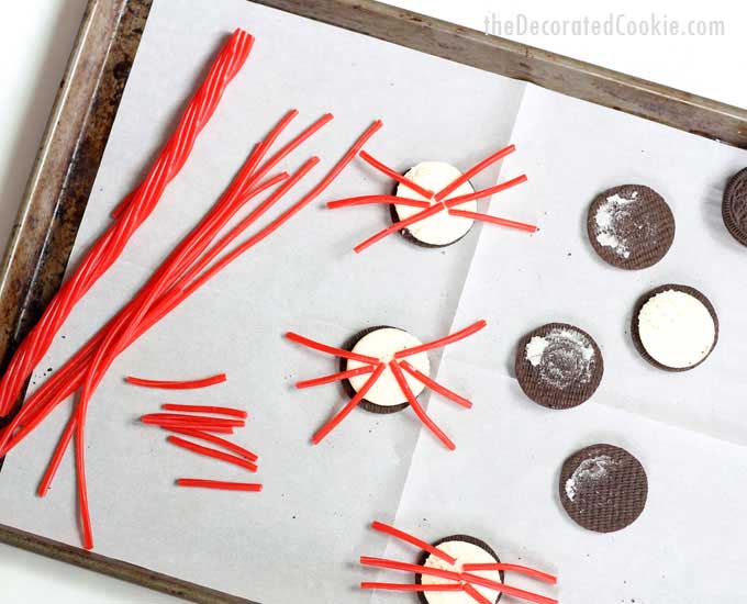 add red licorice legs to Oreo Cookies to make crabs