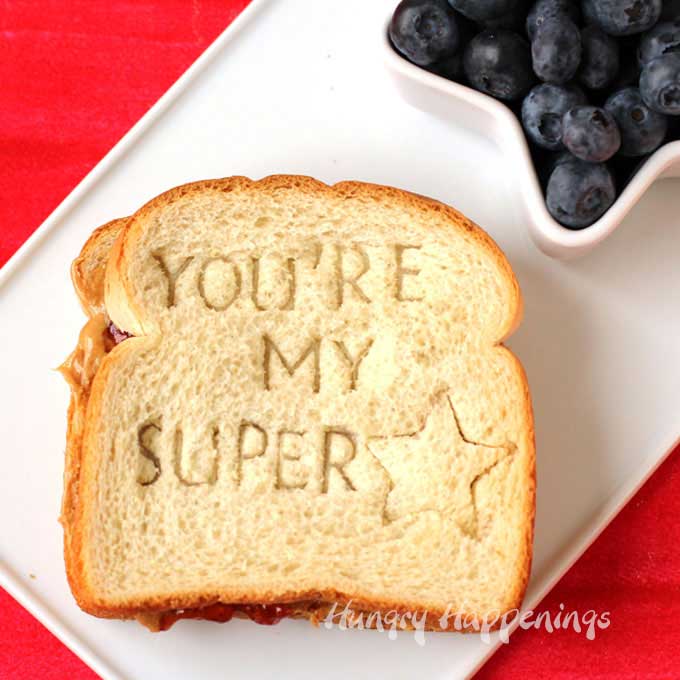 back to school lunch with a personalized sandwich that says, "You're My Super Star" served with blueberries in a star-shaped bowl. 