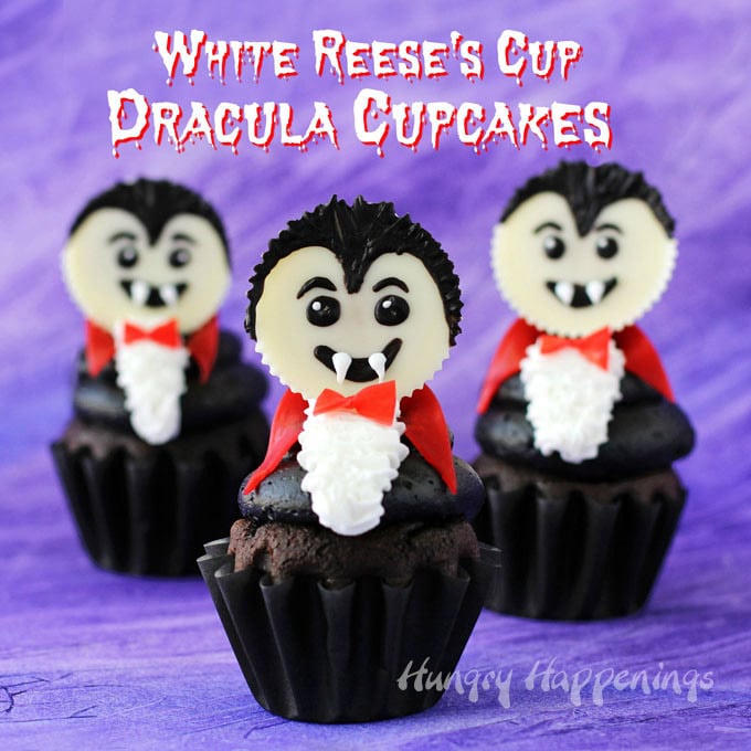 Dracula Cupcakes decorated with White Reese's Cup Vampires. are the perfect dessert for your Halloween party.