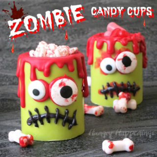 Zombie Candy Cups filled with blood stained candy bones or hot and spicy blood red candies make ghoulish treats for Halloween.